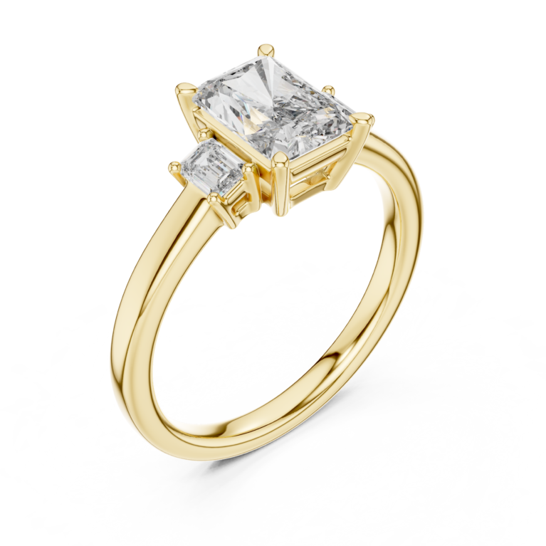 The Emerald & Step Cut Trilogy Ring